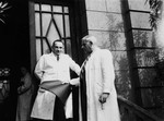 Two physicians stand outside the hospital in Shanghai.