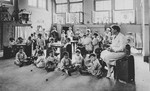 Young Dutch-Jewish children brought from the creche to a children's home by the Dutch underground play in a nursery class.
