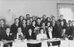 Group portrait of friends and relatives who are celebrating the marriage of Lily Fischel and Leon Pancis in the Bad Wildungen displaced persons' camp.