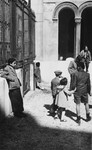Jewish children enter the synagogue in Marseilles where an American Jewish chaplain is organizing Passover religious services.