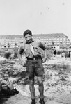 Close-up portrait of a teenager wearing his Maccabi Hatzair uniform.