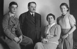 Studio portrait of a Czech-Jewish family.

Pictured are Edward and Mimi Schleissner and their parents.