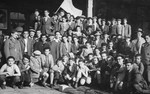 Group portrait of Jewish youth and members of the religious Zionist youth movement, Poale Agudat Yisrael, in a children's home in Switzerland.