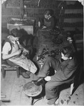 Jewish youth learn shoemaking in a workshop in either the Foehrenwald or Windsheim displaced persons' camp.