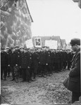 Jewish policmen carrying a portrait of Theodor Herzl march in a Zionist demonstration in the Windsheim displaced persons' camp.