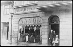 A German family poses outside its clothing store in East Prussia.
