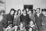 Group portrait of young Jewish men, some in police uniform, in the Zeilsheim displaced person's camp.