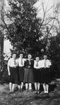 Portrait of five girl scouts in France shortly after liberation; two are Jewish sisters who had survived in hiding.