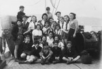 Group portrait of Jewish children en route to Palestine on board the Kedma.