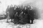 Faiga Rosenbluth (standing on the right) with a group of girl friends from a Zionist youth movement in Kanczuga, Poland.