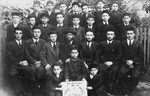 Group portrait of students and rabbis at the Netzach Yisrael Yeshiva in Kozienice.