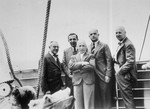 The passenger committee poses on deck of the St. Louis.