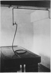 View a medical table used for removing gold teeth from prisoners at the Mauthausen concentration camp.