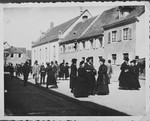 German Jews congregate on the street outside the synagogue in Breisach after Saturday morning services.