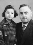 AnneMarie Feller poses with her father Hermann Feller before fleeing to Belgium.