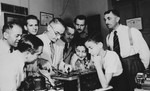 German-Jewish refugees study radio repair in a vocational education class in Cuba.