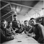 Dutch soldiers play cards inside a barracks during the Phony War.