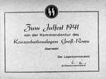 A view of the cover to a photo album of the Gross-Rosen concentration camp, celebrating Julfest (Christmas).