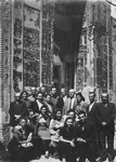 Group portrait of Jewish refugees in Samarkand in front of Tamarlane's tomb.