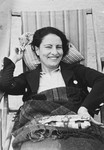 Close-up portrait of a German-Jewish woman relaxing on a deck chair in a vacation spa.
