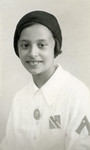 Studio portrait of Anna Kohn wearing the uniform of the Picolo Italiana (the young Fascists).