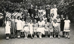 Class portrait of a school in Merano Italy.

Anna Kohn is pictured sitting third from the right.