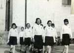 Group portrait of young girls belonging to the Fascist youth movement Picolo Italiana rallying for Mussolini.
