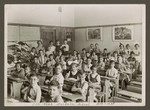 Group portrait of children in an elementary class in the Berlage school in Amsterdam.