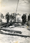 Survivors from the shipwrecked Pentcho await help on the island of Kamilonissi.