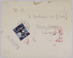 An envelope containing a letter sent from Warsaw to New York.