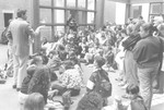 A teacher lectures to a visiting school group in the Hall of Witness at the U.S.