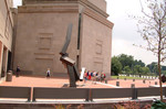 Visitors crossing Eisenhower Plaza,  the U.S. Holocaust Memorial Museum.