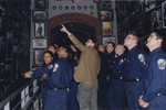 Andres Abril guides Washington, D.C. police cadets through the Tower of Faces (the Yaffa Eliach Shtetl Collection) segment of the permanent exhibition at the U.S.