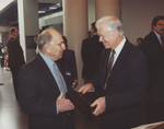 Miles Lerman and Jimmy Carter exchange gifts during Jimmy Carter's visit to the United States Holocaust Memorial Museum.