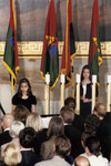 Amanda Nickels (left) and Leah Katz-Hernandez (right) assist the candlelighters at the 2000 Days of Remembrance ceremony in the capitol rotunda.