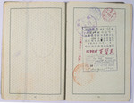 Pages twelve and thirteen of the German passport issued to Isidor Abraham (the grandfather of the donor's wife) on April 11, 1939.