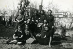 Class photo in a garden in Salonika, March 1939.

Jenny Ezratty is pictured the middle of the center row.