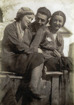 Riva and Dimo Szrajer (right) pose with an unidentified friend (left).